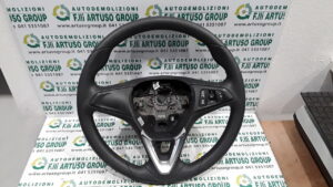 VOLANTE IN PELLE OPEL CORSA (12/14>) CON COMANDI AL VOLANTE KM40.000 . SPEDIZIONE GRATUITA IN TUTTA ITALIA.